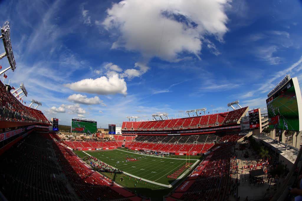 What is the Super Bowl Experience in Tampa Bay this year, and how will the NFL's OnePass app help?