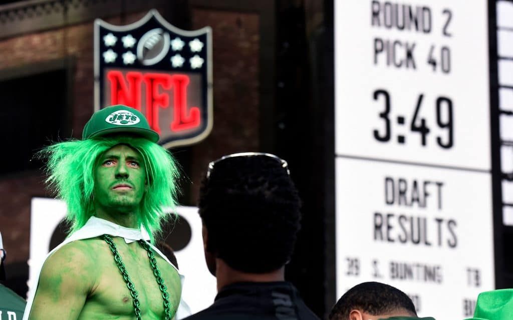 A New York Jets fan looks back at the crowd from the NFL Draft stage during the NFL Draft second and third rounds on Friday, April 26, 2019, in Nashville, Tenn.