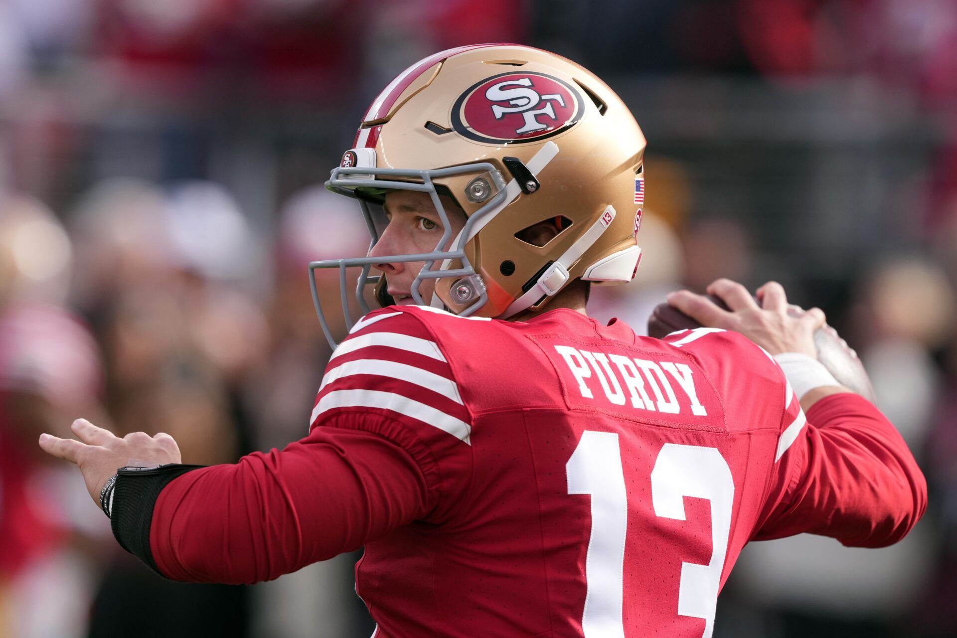 San Francisco 49ers QB Brock Purdy (13) warming up before a game.