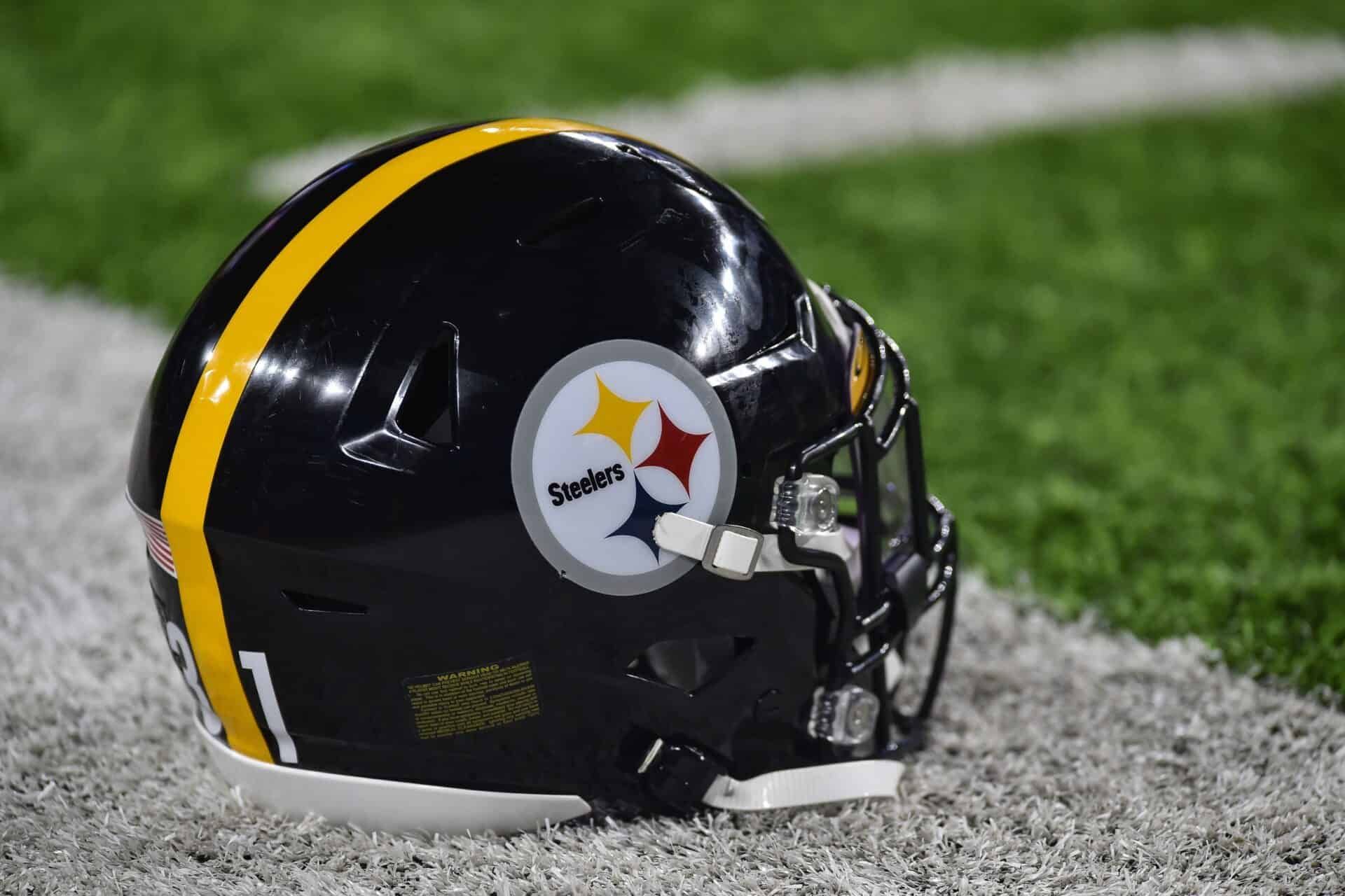 The Pittsburgh Steelers helmet displayed on the sidelines of the field.