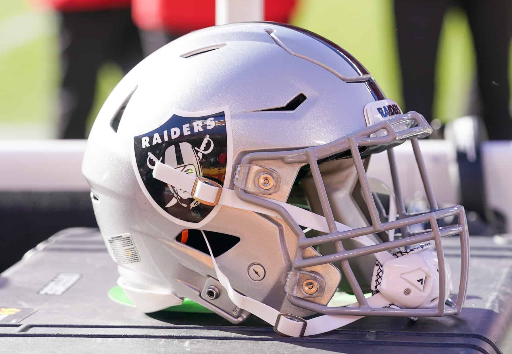 The Las Vegas Raiders helmet laid out on the team's bench.