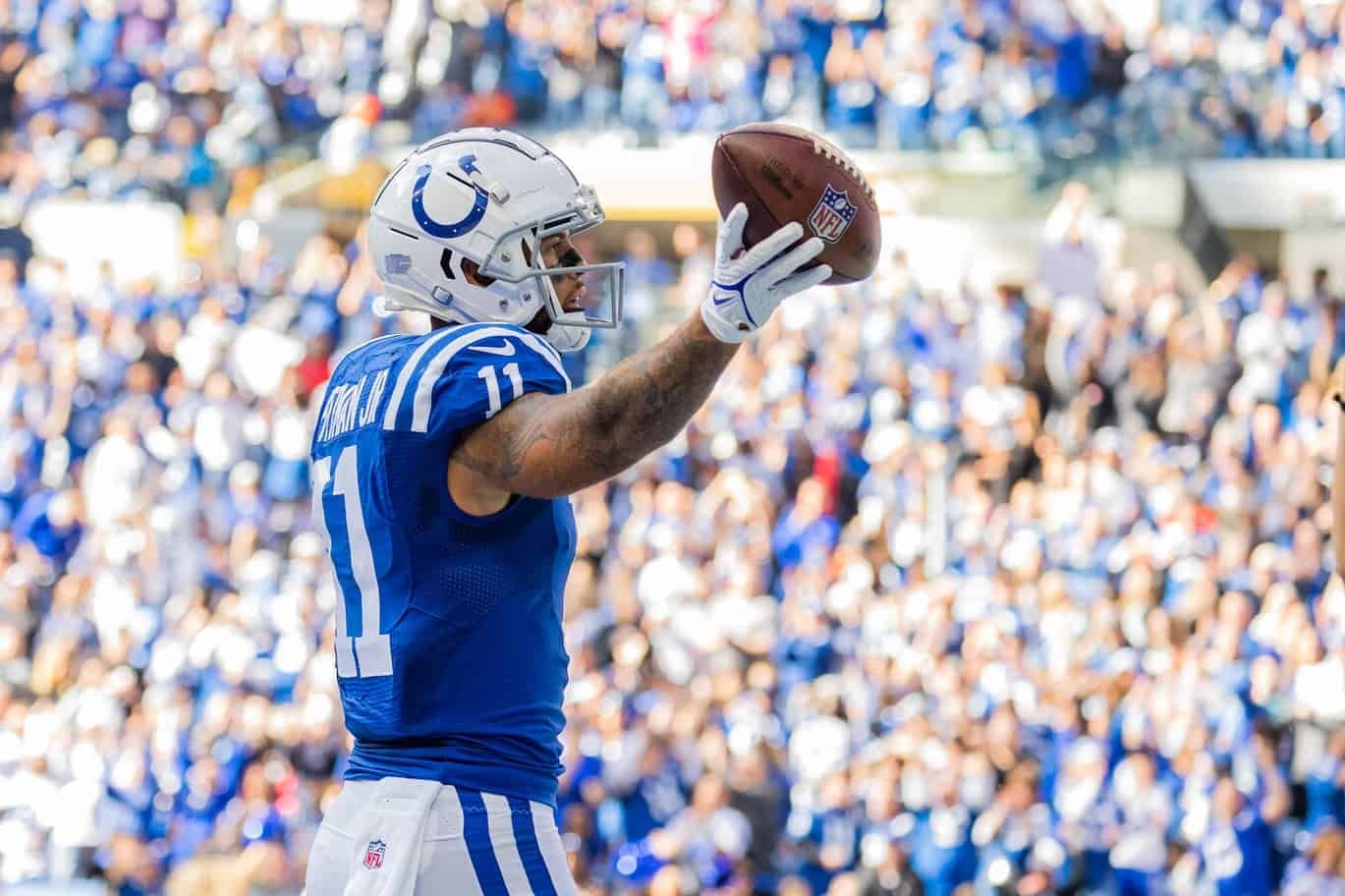 Indianapolis Colts wide receiver Michael Pittman (11) celebrates his touchdown in the first quarter against the Tennessee Titans at Lucas Oil Stadium.