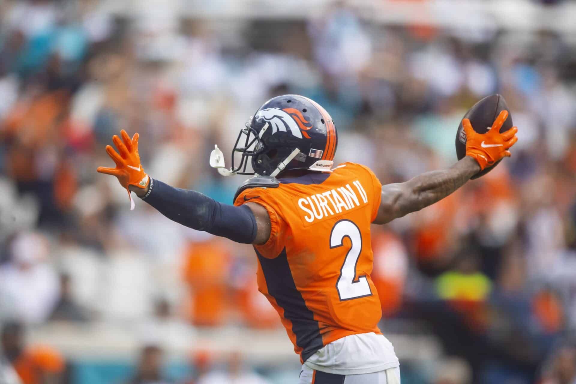 Denver Broncos cornerback Pat Surtain II (2) celebrates an interception against the Jacksonville Jaguars.