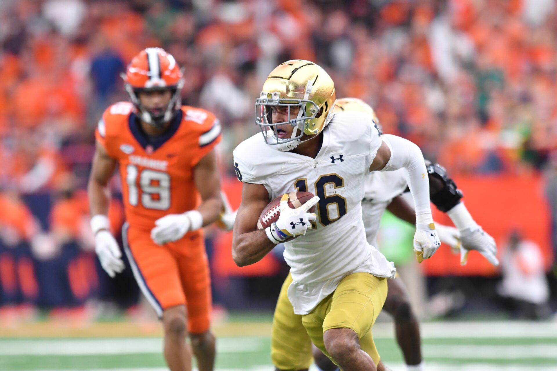 Brandon Joseph (16) returns an interception for a touchdown against the Syracuse Orange.