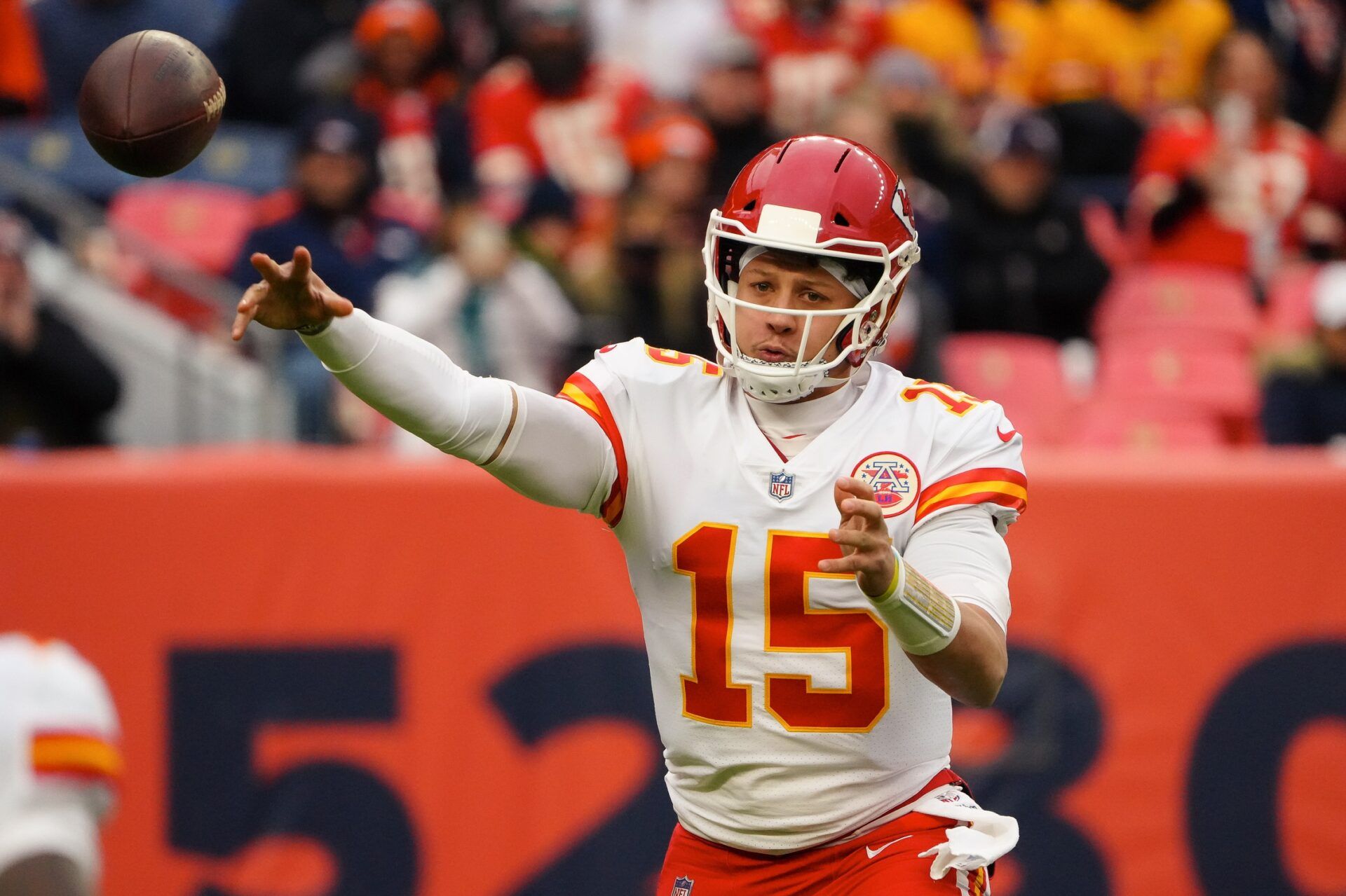 Kansas City Chiefs quarterback Patrick Mahomes (15) attempts a pass in the first quarter against the Denver Broncos at Empower Field at Mile High.