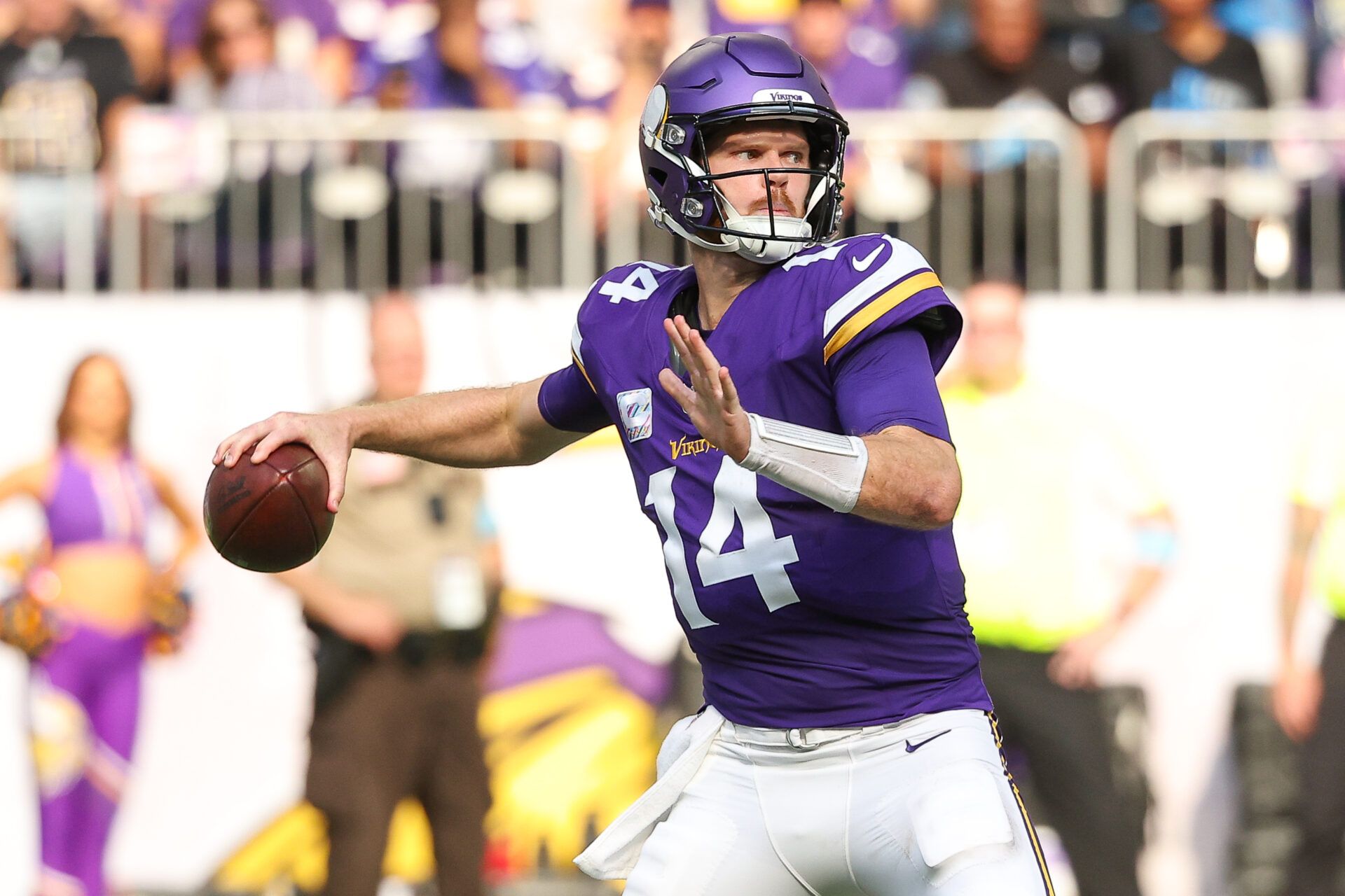 Oct 20, 2024; Minneapolis, Minnesota, USA; Minnesota Vikings quarterback Sam Darnold (14) throws the ball against the Detroit Lions during the third quarter at U.S. Bank Stadium. Mandatory Credit: Matt Krohn-Imagn Images