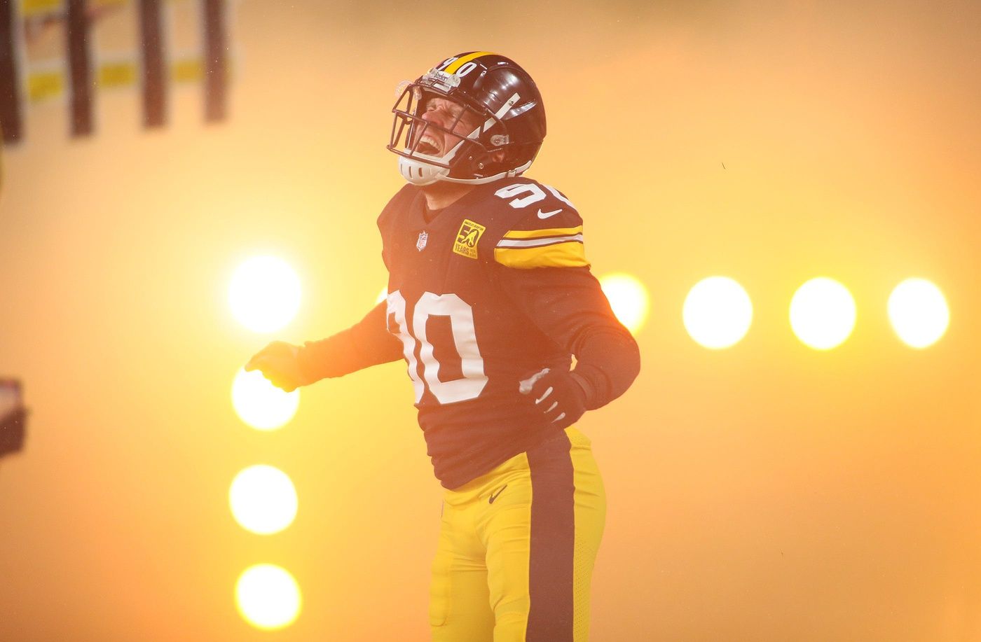 Pittsburgh Steelers T.J. Watt jumps in the air while being introduced prior to the start of a game.