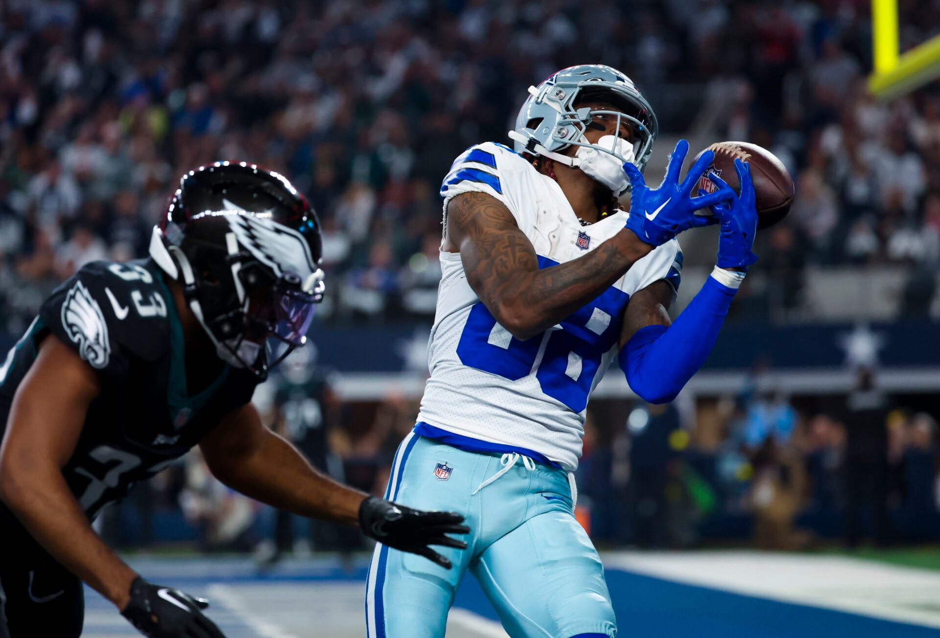 Dallas Cowboys wide receiver CeeDee Lamb (88) cannot make a catch for a touchdown as Philadelphia Eagles cornerback Josiah Scott (33) defends during the third quarter at AT&T Stadium.