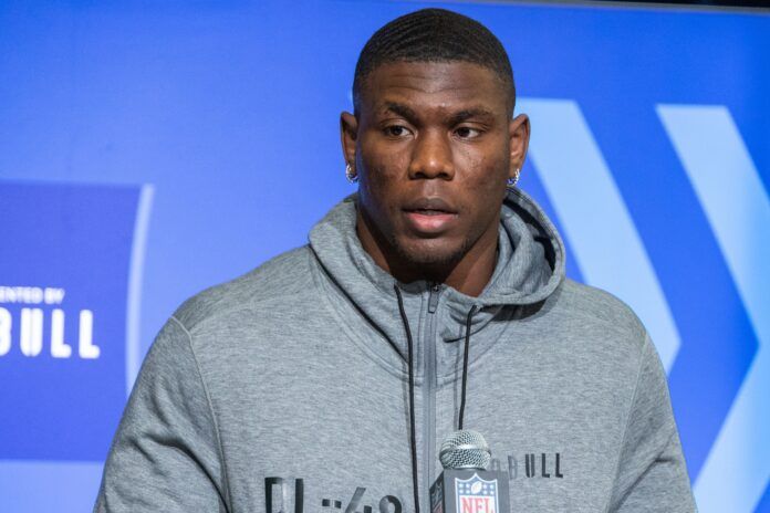 Keion White speaks to the press at the NFL Combine.