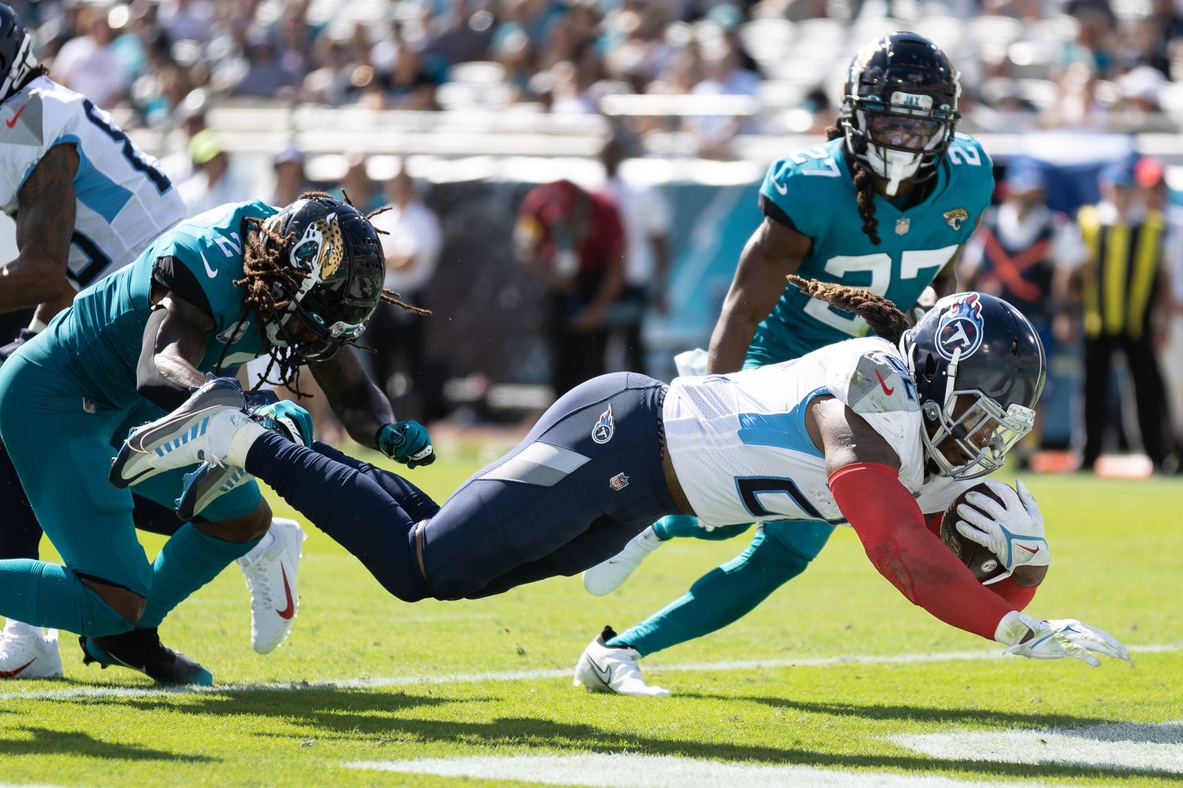 Jaguars vs. Titans Prop Bets for Saturday Football: Derrick Henry, Joshua Dobbs, Trevor Lawrence, and Travis Etienne Jr.