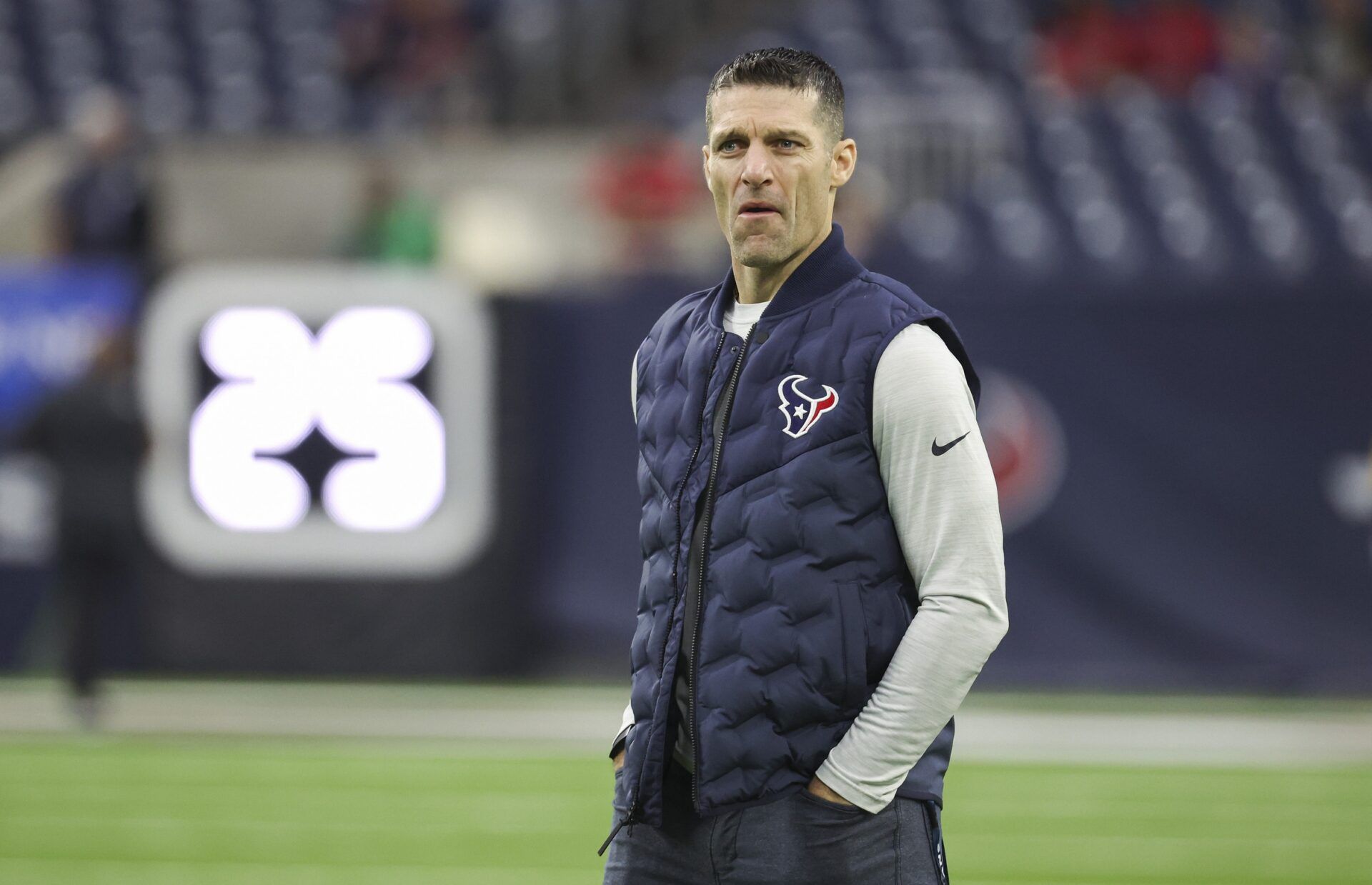 Houston Texans general manager Nick Caserio walks on the field before a game against the Jacksonville Jaguars.