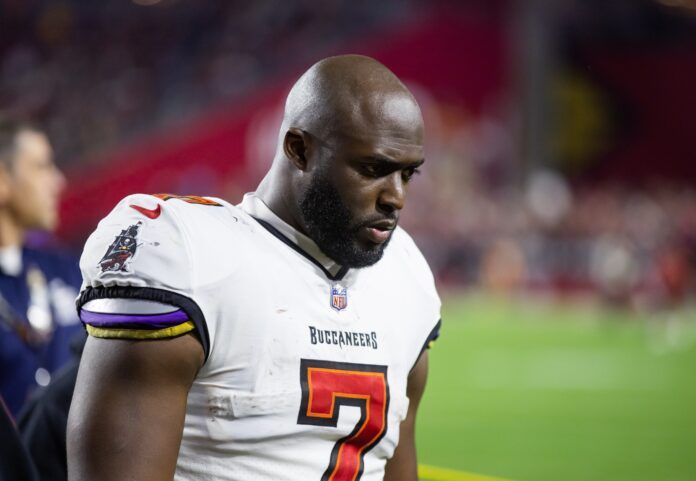 Leonard Fournette walking the sideline against the Cardinals.