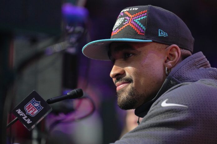 Philadelphia Eagles quarterback Jalen Hurts (1) speaks with media during Super Bowl Opening Night at Footprint Center.