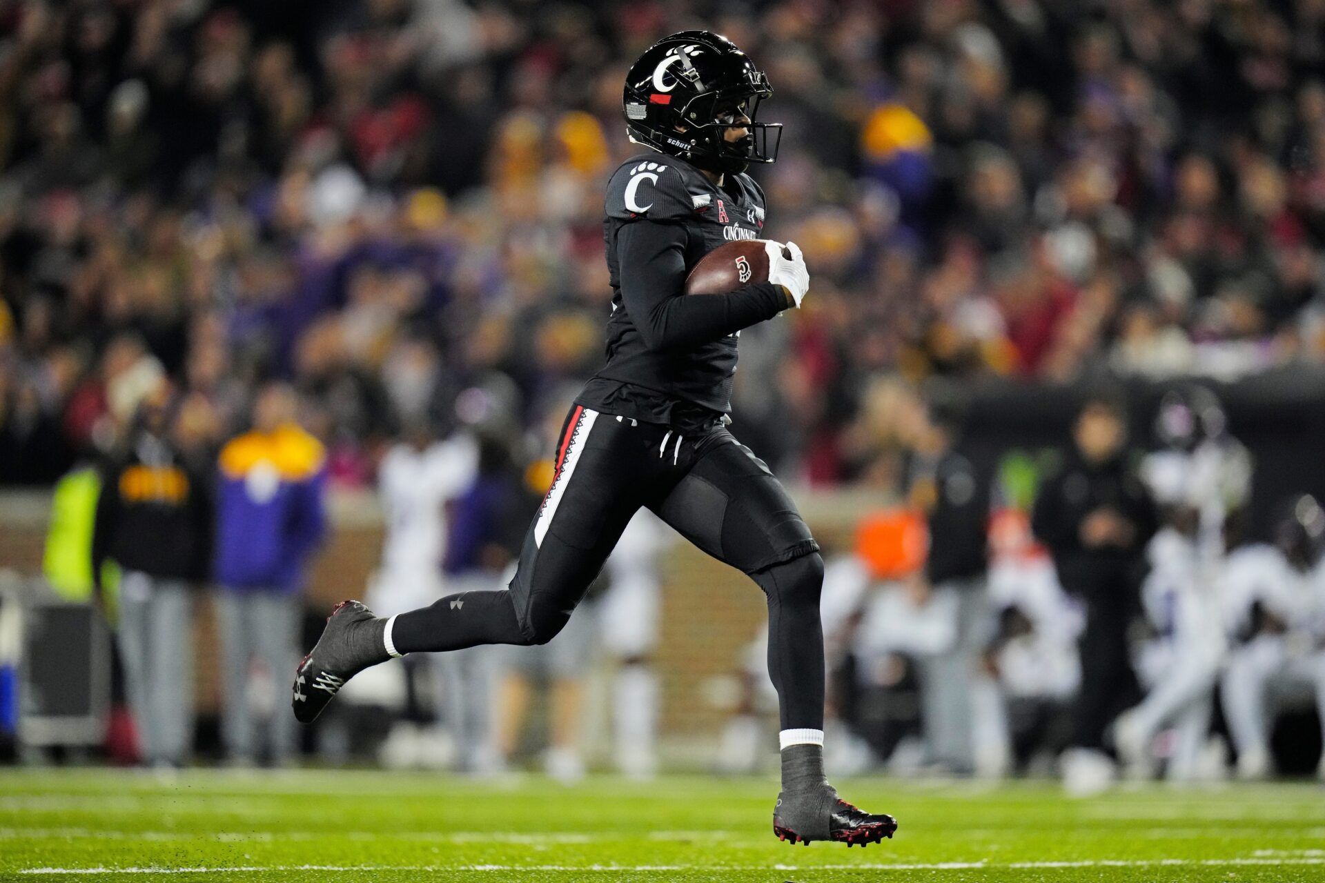 Wide receiver Tyler Scotts (21) breaks away for a touchdown.