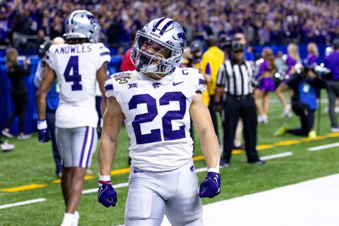 Kansas State Wildcats running back Deuce Vaughn (22) celebrates his touchdown scored against the Alabama Crimson Tide.