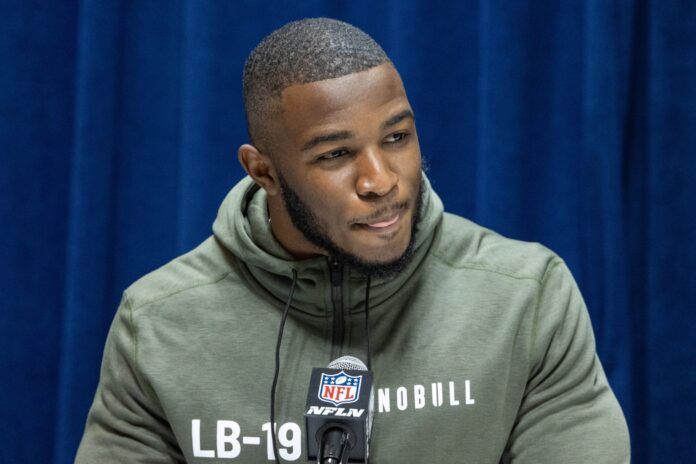 Isaiah Moore speaks to the press at the NFL Combine at Lucas Oil Stadium.