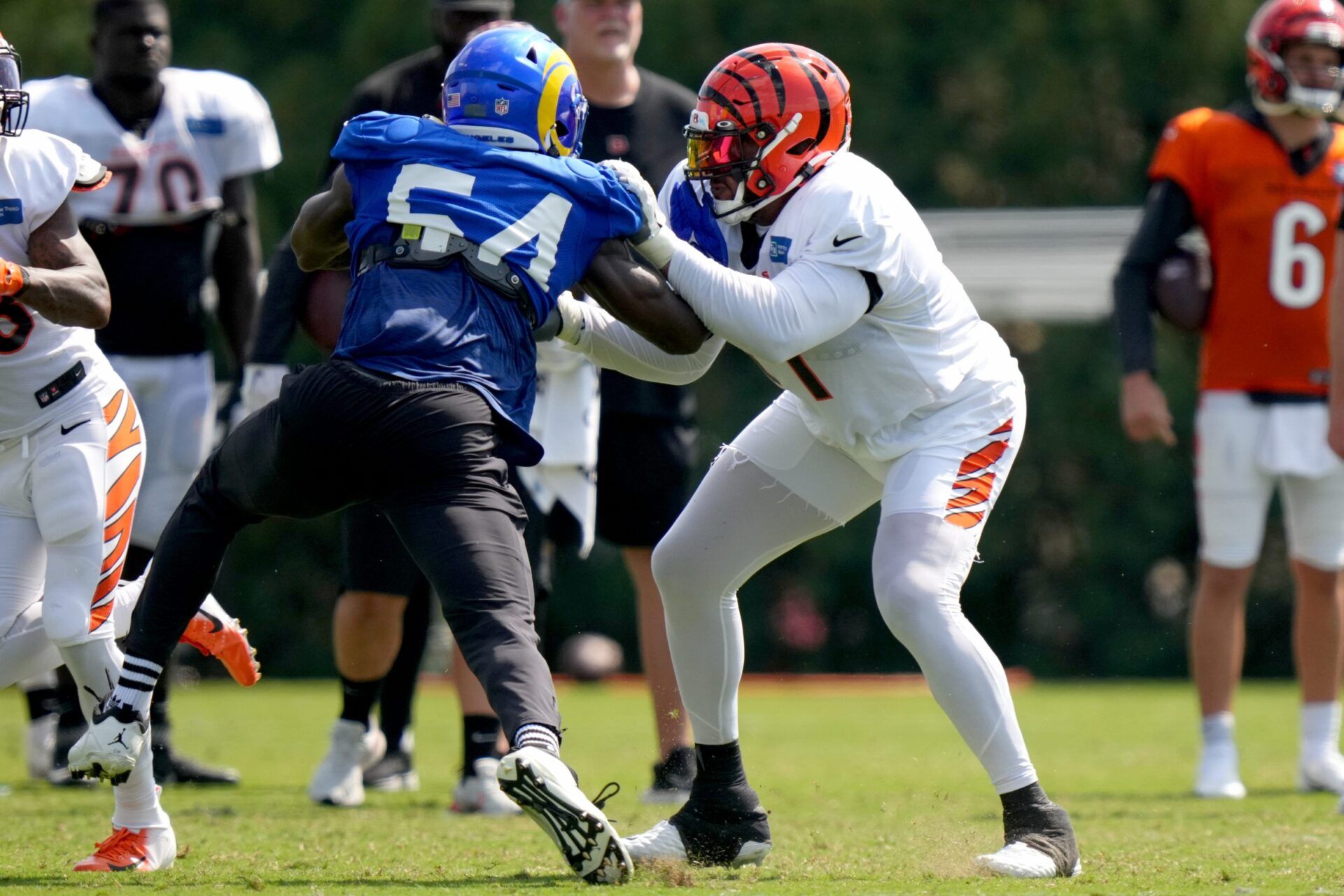 Cincinnati Bengals OL La'el Collins (71) blocks Rams LB Leonard Floyd (54) during a joint practice.