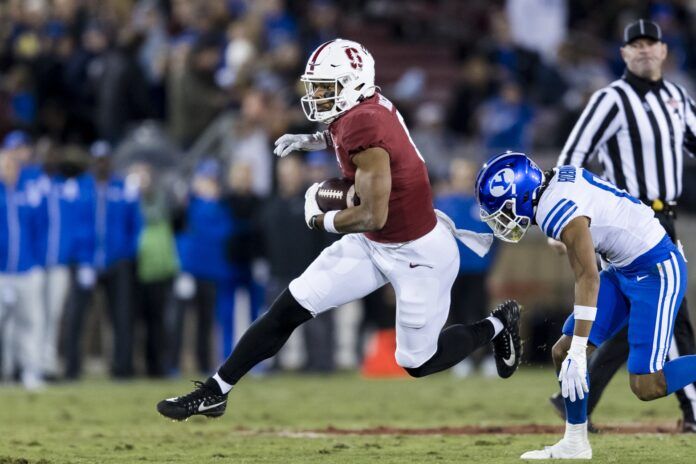 Stanford wide receiver Elijah Higgins (6) runs the ball against BYU.