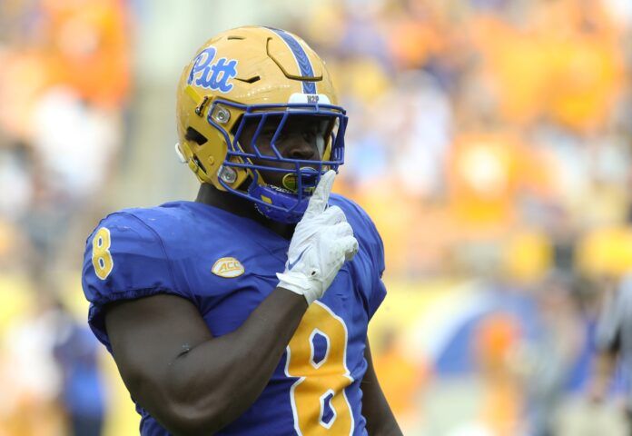 Pittsburgh Panthers defensive lineman Calijah Kancey (8) signals silence after recording a sack.