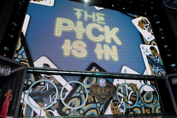 “The Pick Is In” is displayed before Georgia defensive end Travon Walker is announced as the first overall pick to the Jacksonville Jaguars.