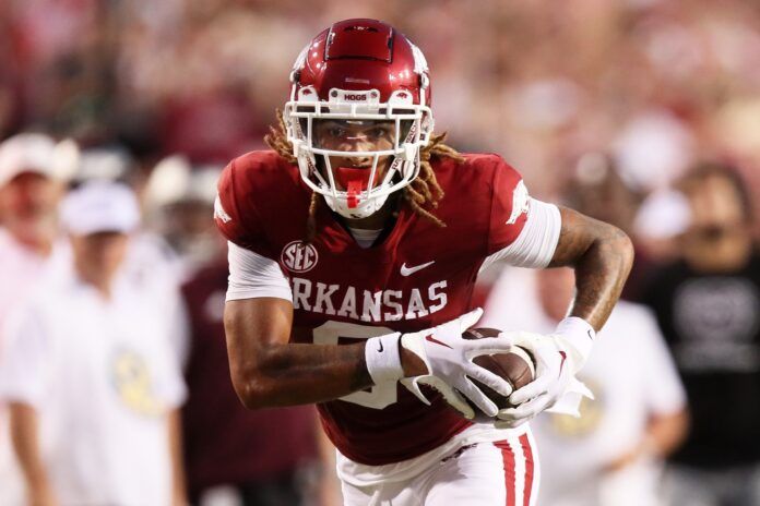 Jadon Haselwood runs after a catch for a touchdown.