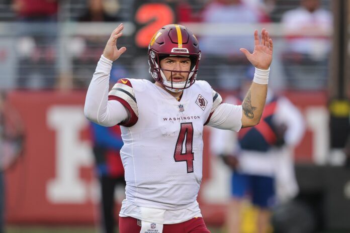 Taylor Heinicke celebrates after a touchdown during the third quarter against the San Francisco 49ers.