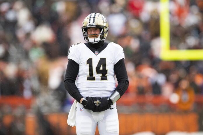 Andy Dalton looks toward the sideline during a timeout.