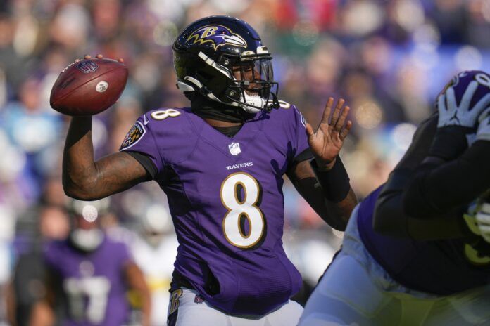 Baltimore Ravens quarterback Lamar Jackson (8) throws a pass.