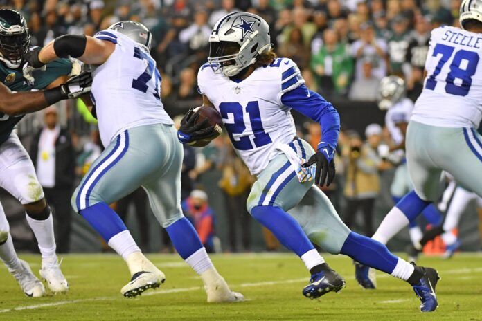 Dallas Cowboys RB Ezekiel Elliott makes a rush against the Eagles.