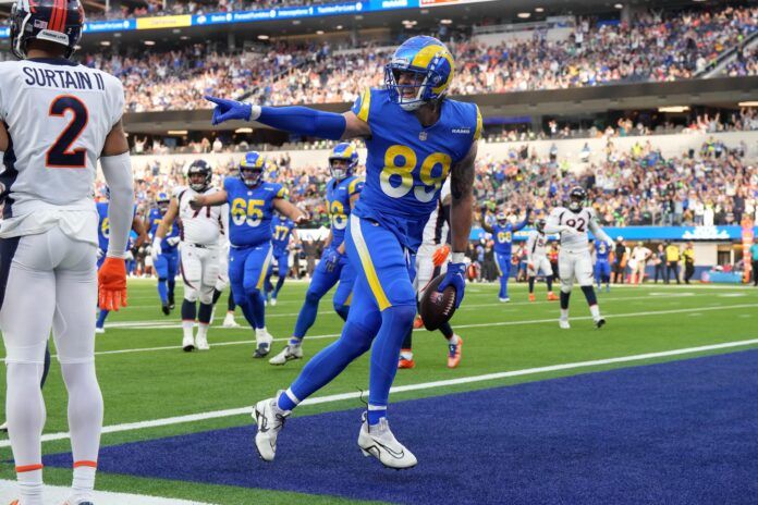 Tyler Higbee celebrates after scoring on a 9-yard touchdown pass against the Denver Broncos.