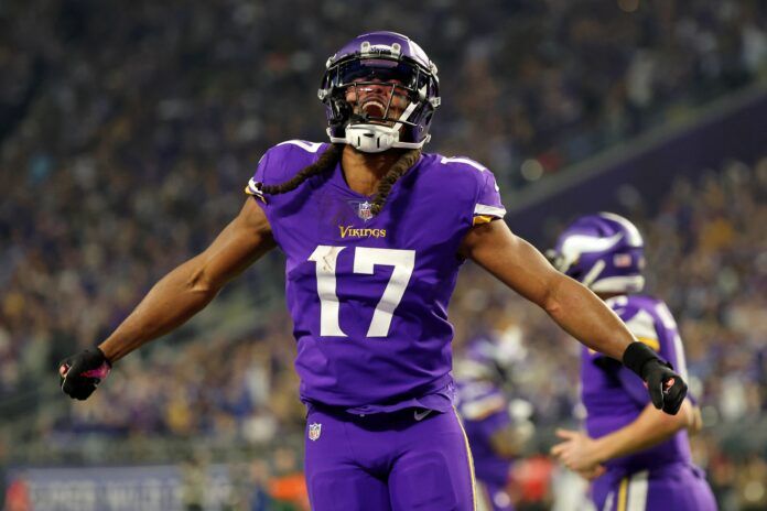 Minnesota Vikings wide receiver K.J. Osborn (17) gets excited after scoring a touchdown.