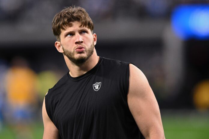 Las Vegas Raiders TE Foster Moreau looks on before the game.