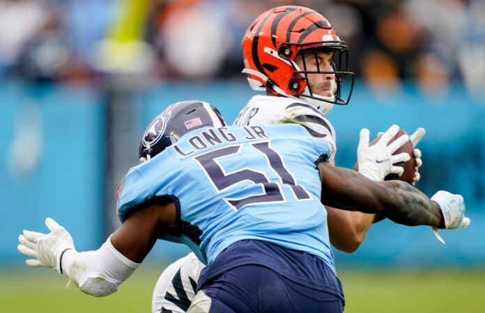 Tennessee Titans LB David Long Jr. (51) tackles Bengals WR Trent Taylor (11).