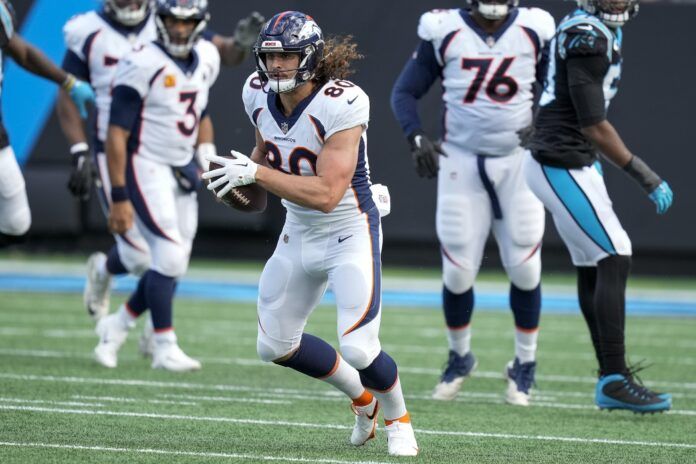 Greg Dulcich runs for yards after catch against the Carolina Panthers.