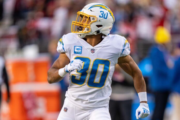 Austin Ekeler warms up before a game against the San Francisco 49ers.