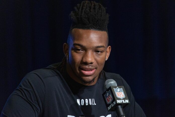 Texas running back Bijan Robinson speaks to the press at the NFL Combine.