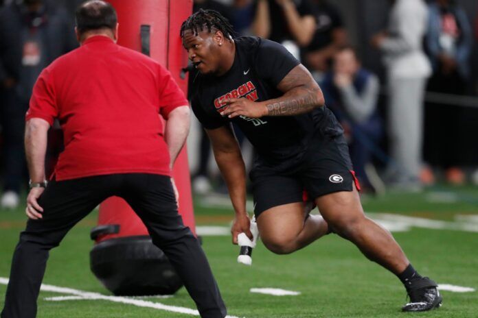 Georgia defensive tackle Jalen Carter runs a drill during the Bulldogs' Pro Day.