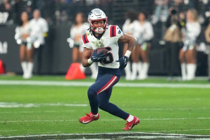 New England Patriots WR Jakobi Meyers (16) runs with the ball after the catch.