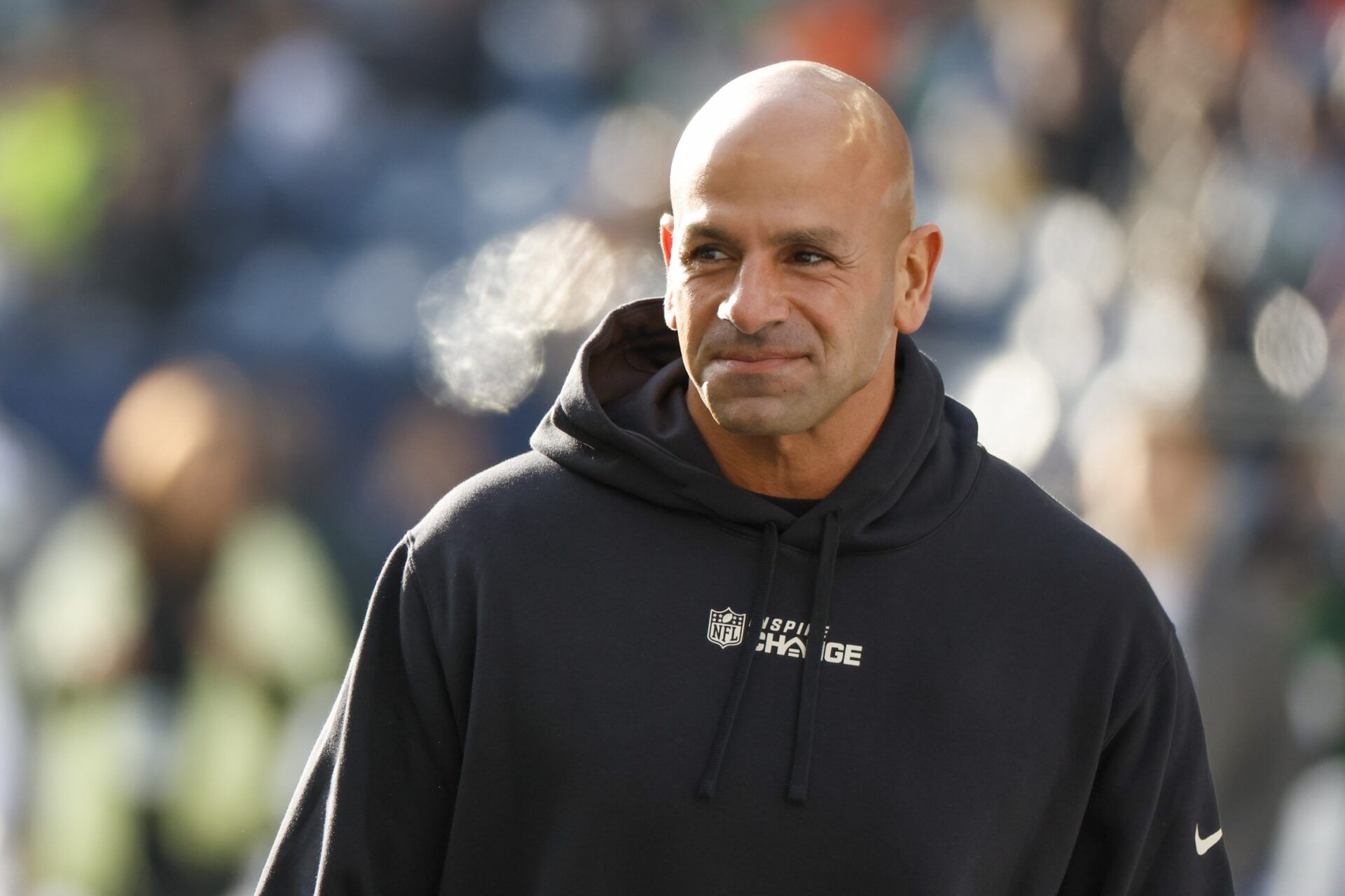 New York Jets head coach Robert Saleh watches pregame warmups.