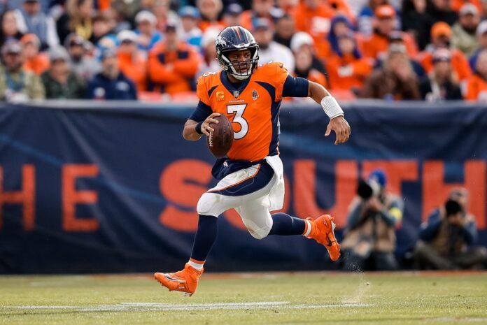 Denver Broncos QB Russell Wilson (3) runs with the ball.