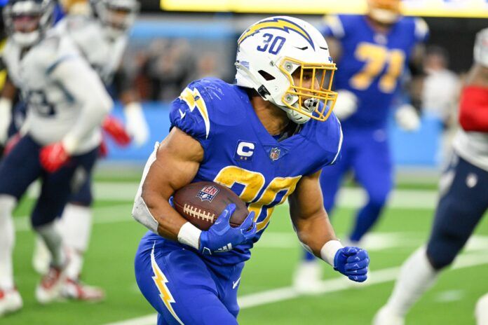 Austin Ekeler carries the ball during the fourth quarter against the Tennessee Titans.