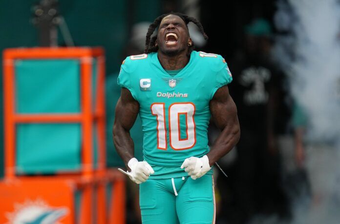 Tyreek Hill takes the field before the start of the game against the New York Jets.