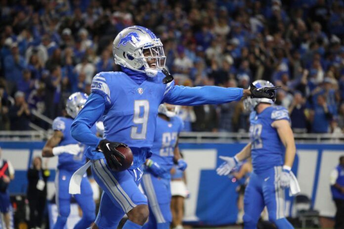 Detroit Lions wide receiver Jameson Williams (9) celebrates after scoring a touchdown.