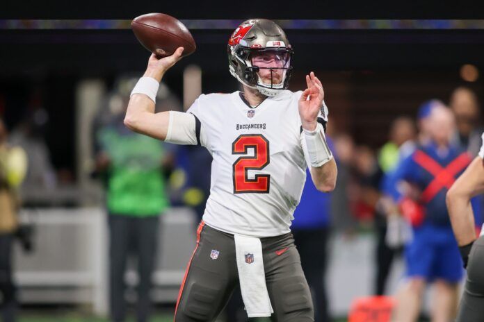 Kyle Trask throws a pass against the Atlanta Falcons in the second half.