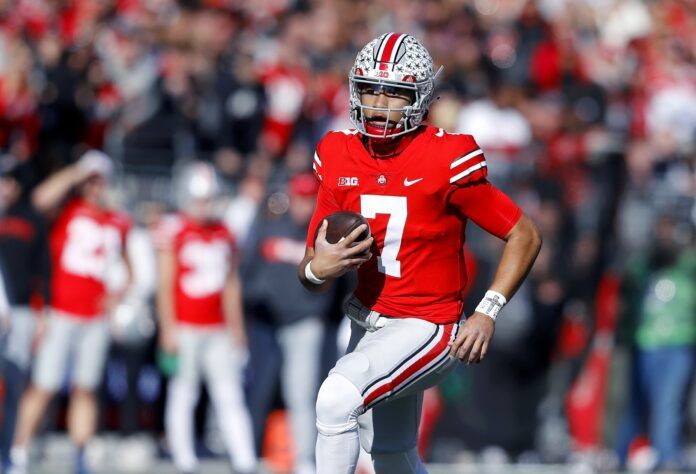 Ohio State QB C.J. Stroud (7) runs with the ball.