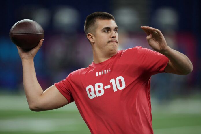 Purdue quarterback Aidan O'Connell participates in drills at Lucas Oil Stadium.