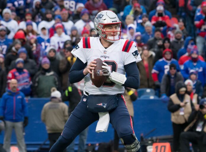 Mac Jones drops back to pass in the second quarter against the Buffalo Bills.