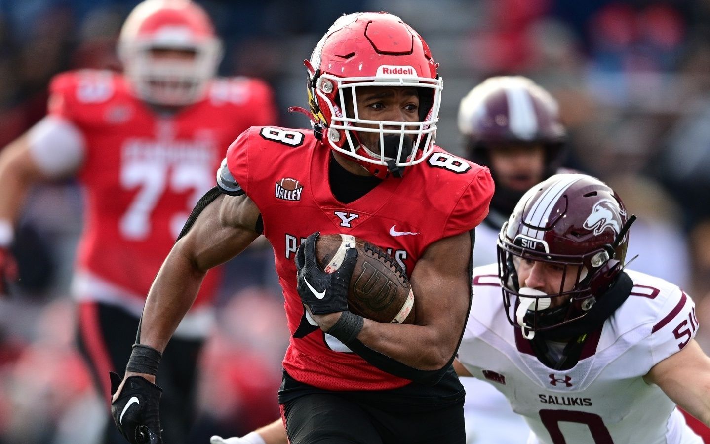 Jaleel McLaughlin rushing the ball against Eastern Kentucky.