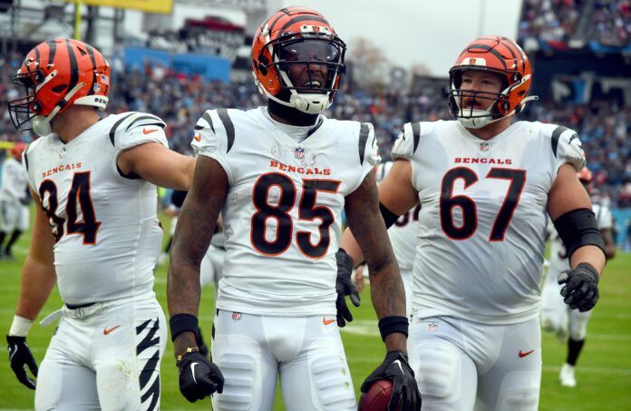 Tee Higgins celebrates after a touchdown during the second half against the Tennessee Titans.