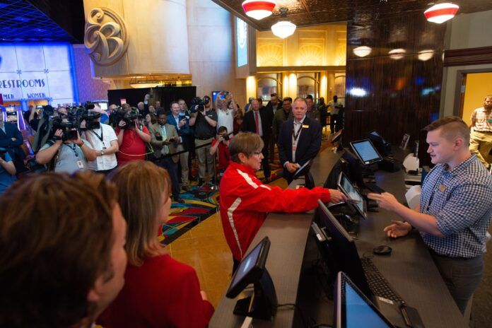 Kansas governor Laura Kelly makes the first legal sports bet in the state.